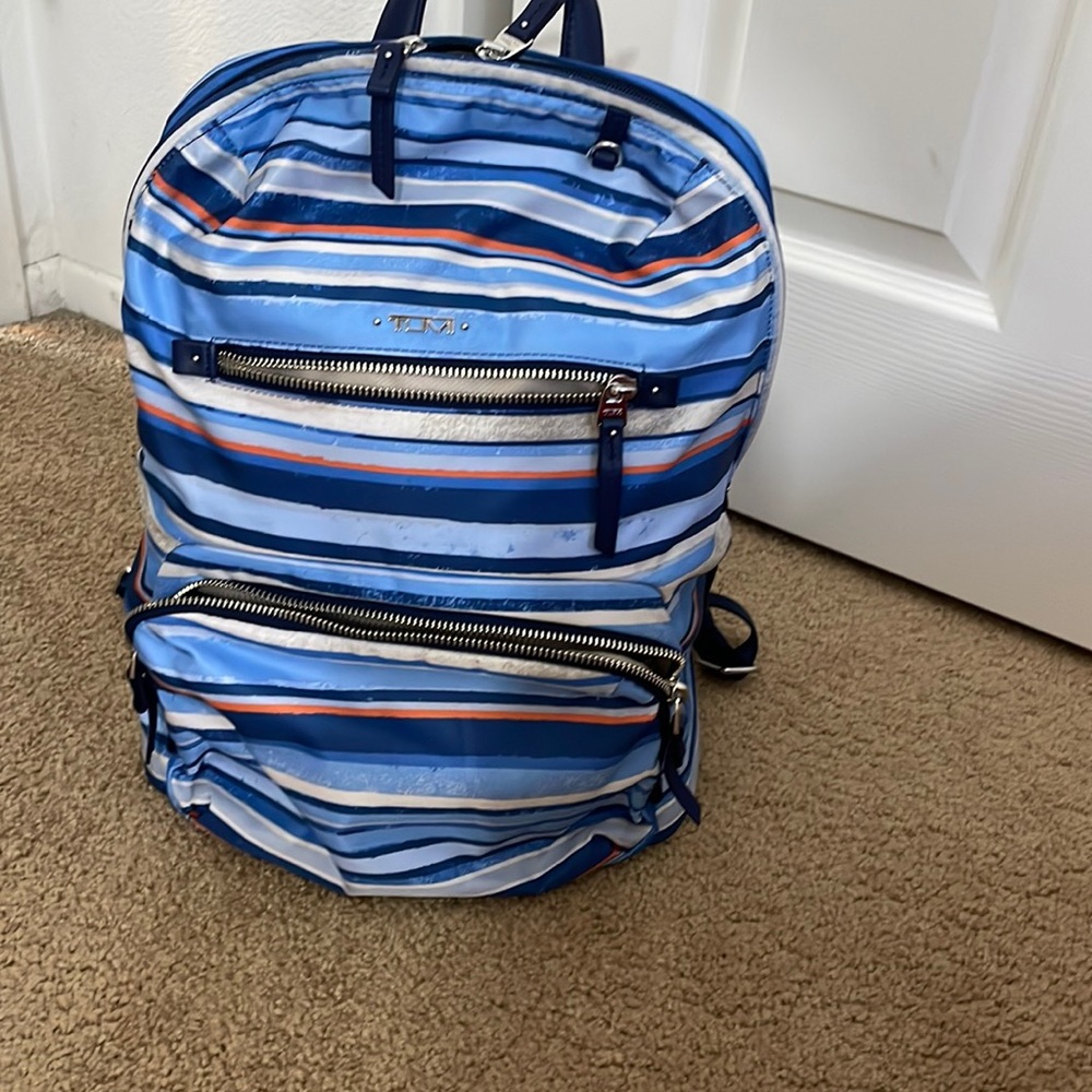 Tumi backpack price firm